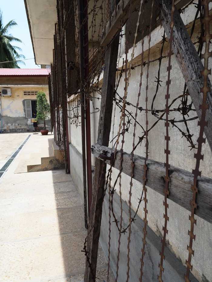 Barbed wire lined the openings of the school to deter escapes