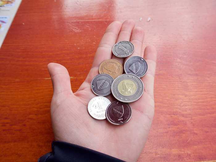 money hand mark bosnia table hand