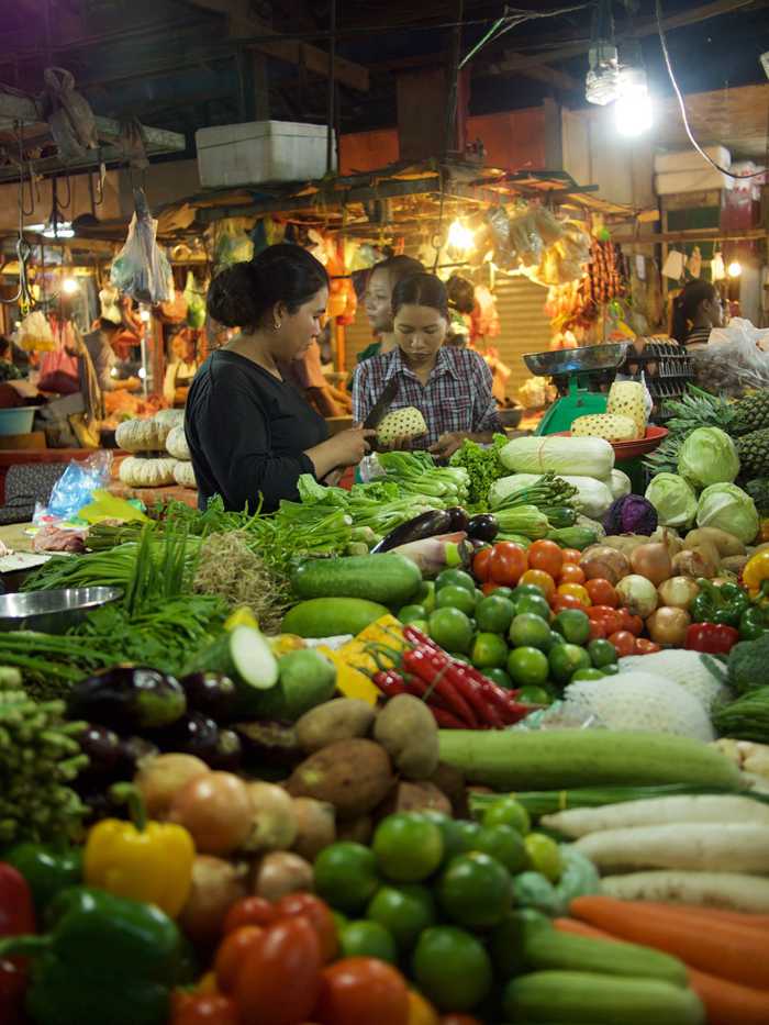 Women picking out fresh veggies