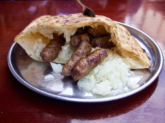 Cevapi with a motherload of onions