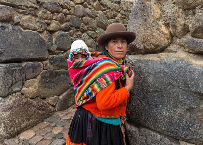 local woman and child pose for a photo