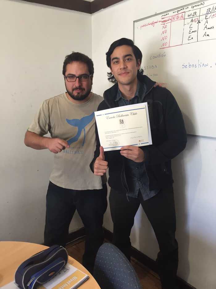 Gabe receiving his certification of completion