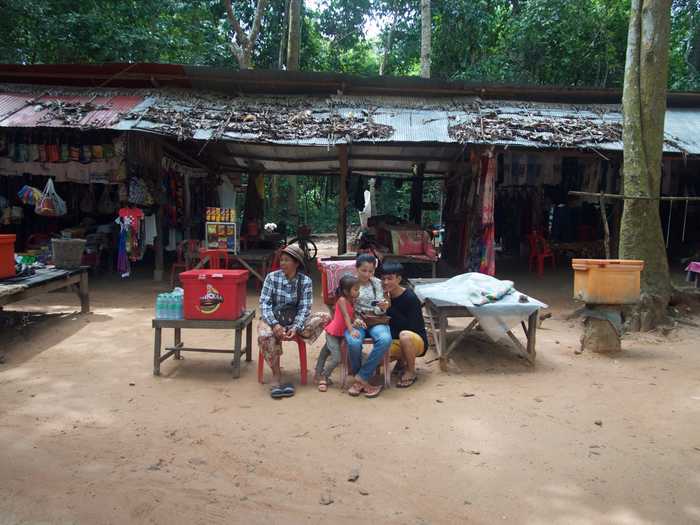 Small restaurants and shops located on the road and near the temples