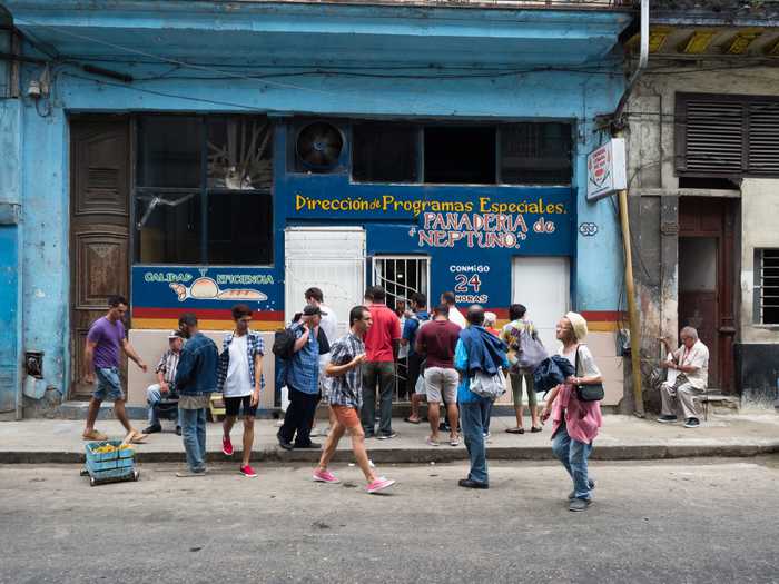 cuba travel market unique panaderia crowded busy neptuno