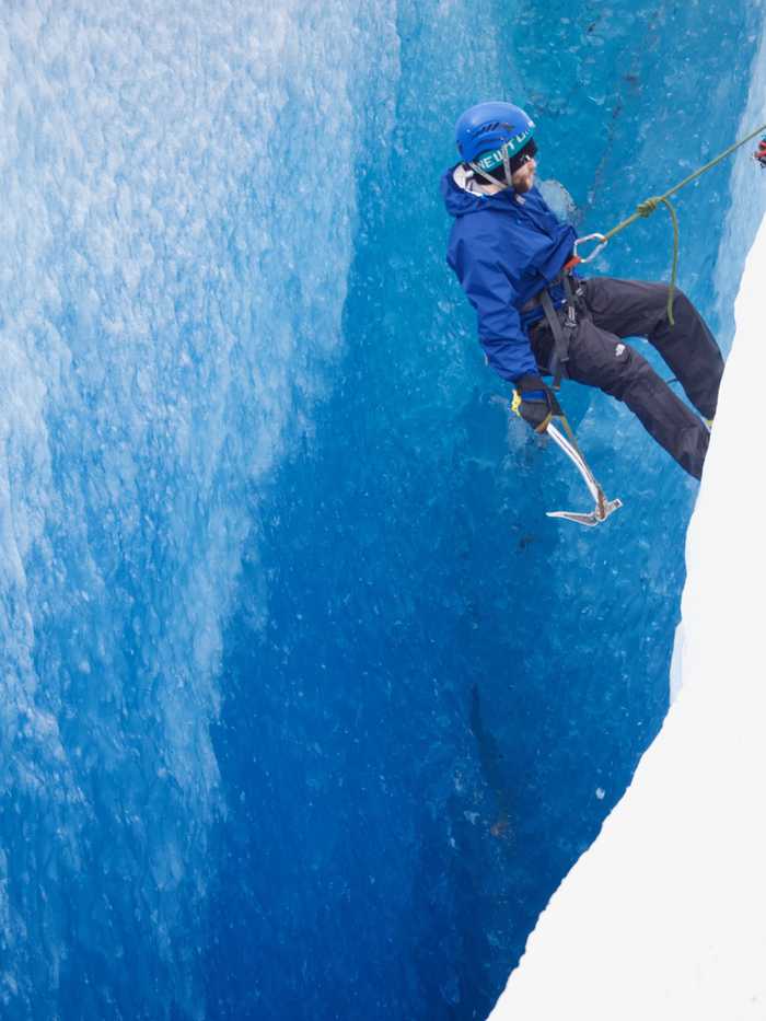 A friend getting ready to descend into the crevasse